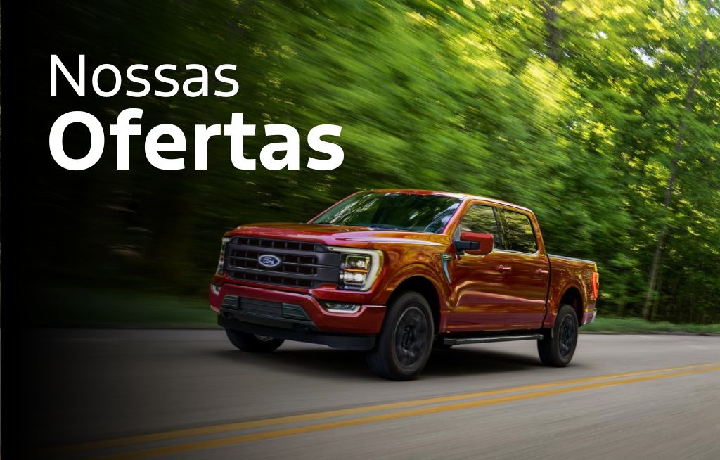 Imagem com texto e uma Ford F-150 Lariat vermelha em movimento