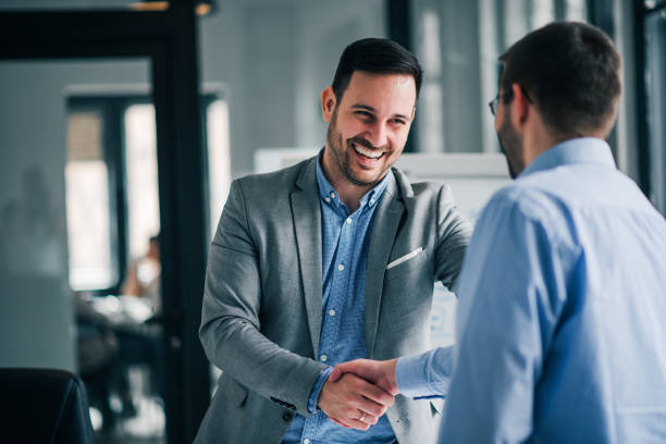 two men shaking hands