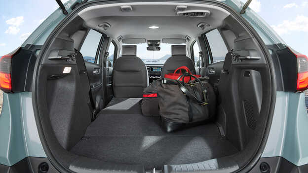 View of a Jazz from the rear with the tailgate open and the seats down to illustrate the impressive capacity 